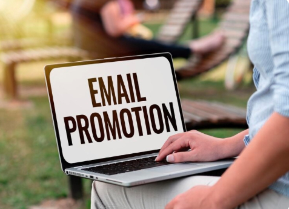 Laptop screen displaying a professional promotional email with product image, discount offer, and call-to-action button